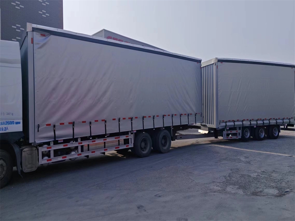 Central axle curtainside truck